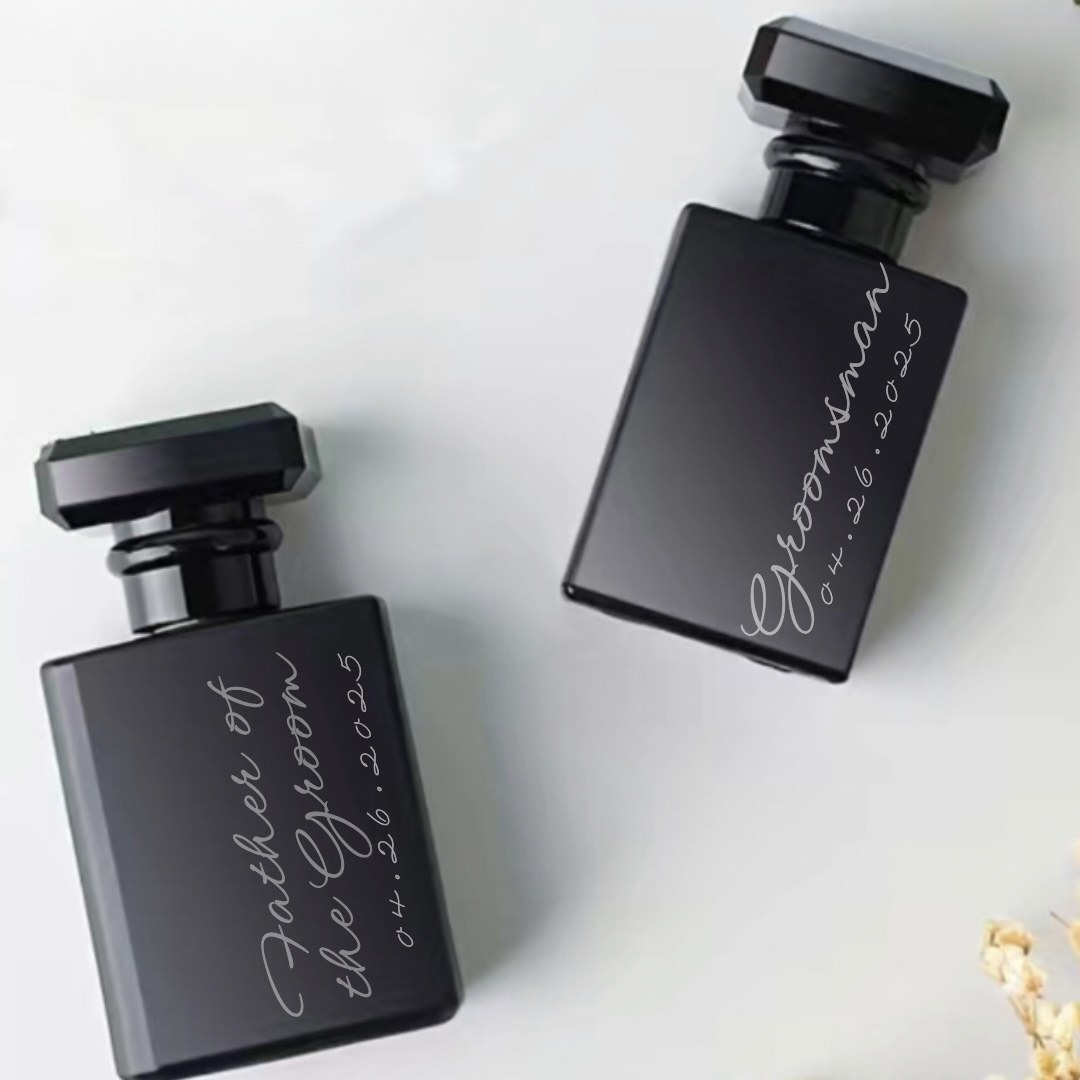 Two engraved cologne bottles