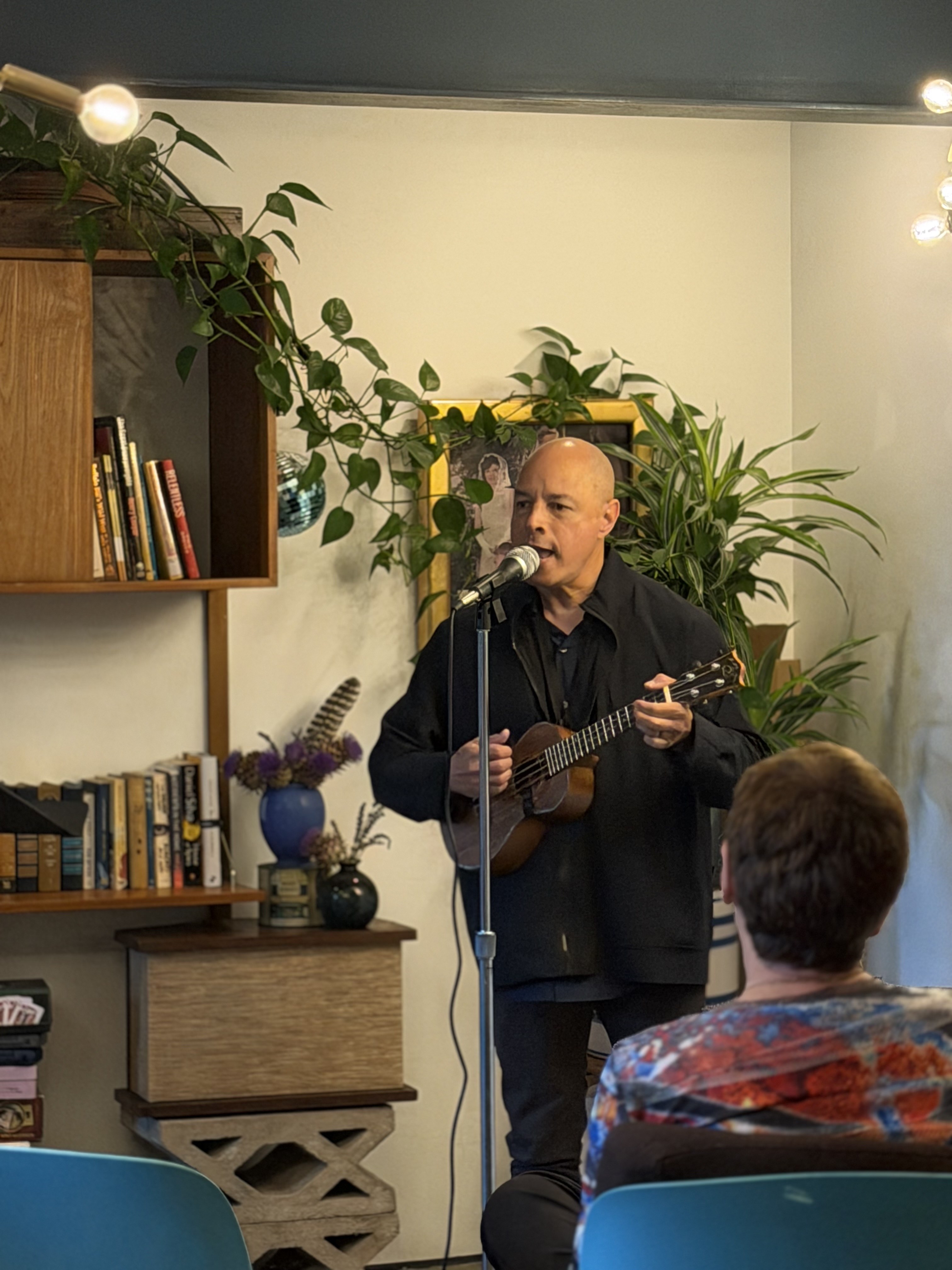Musician performing for a Stage Left audience