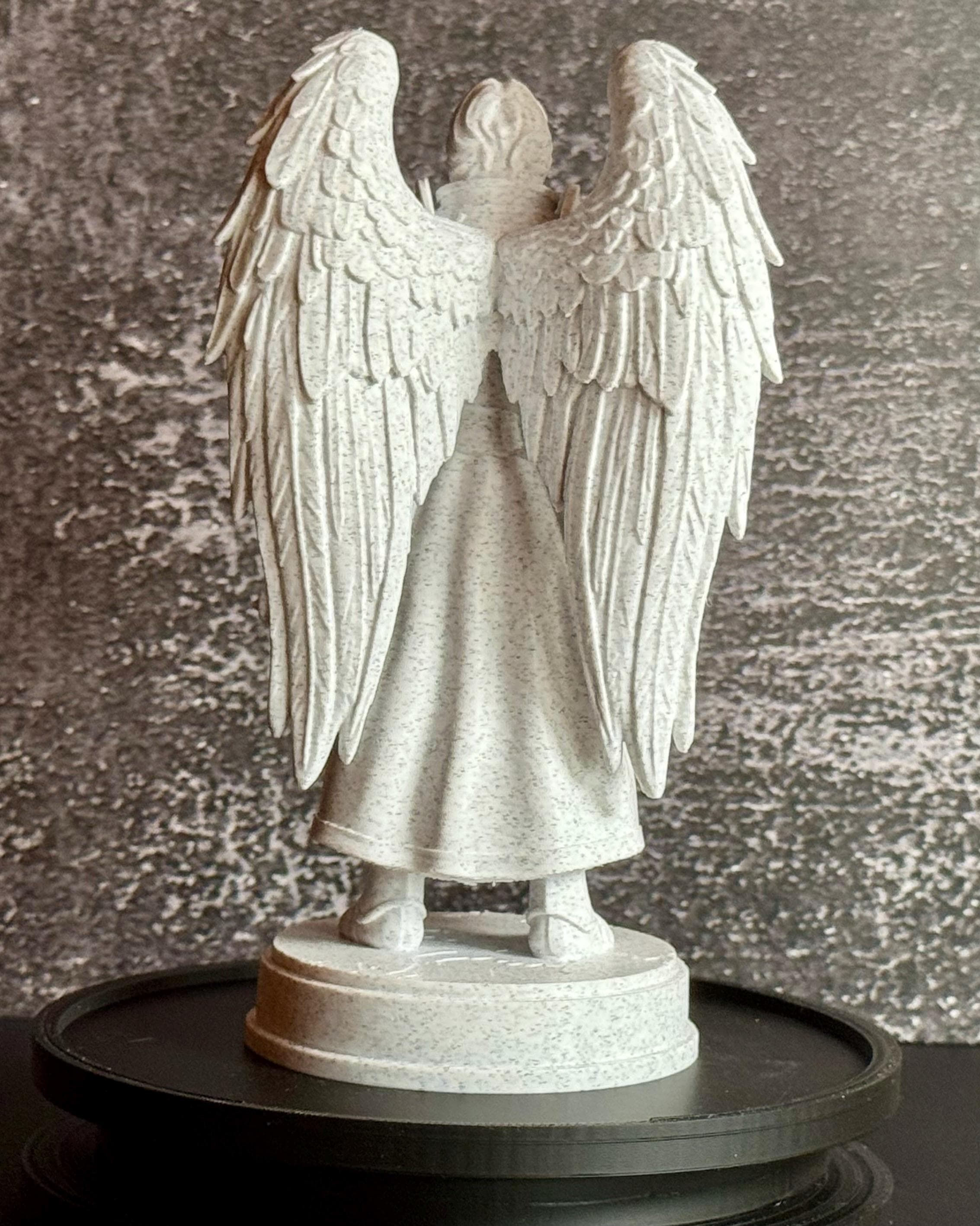 Archangel Uriel Statue – Angel of Wisdom with Flame & Scroll