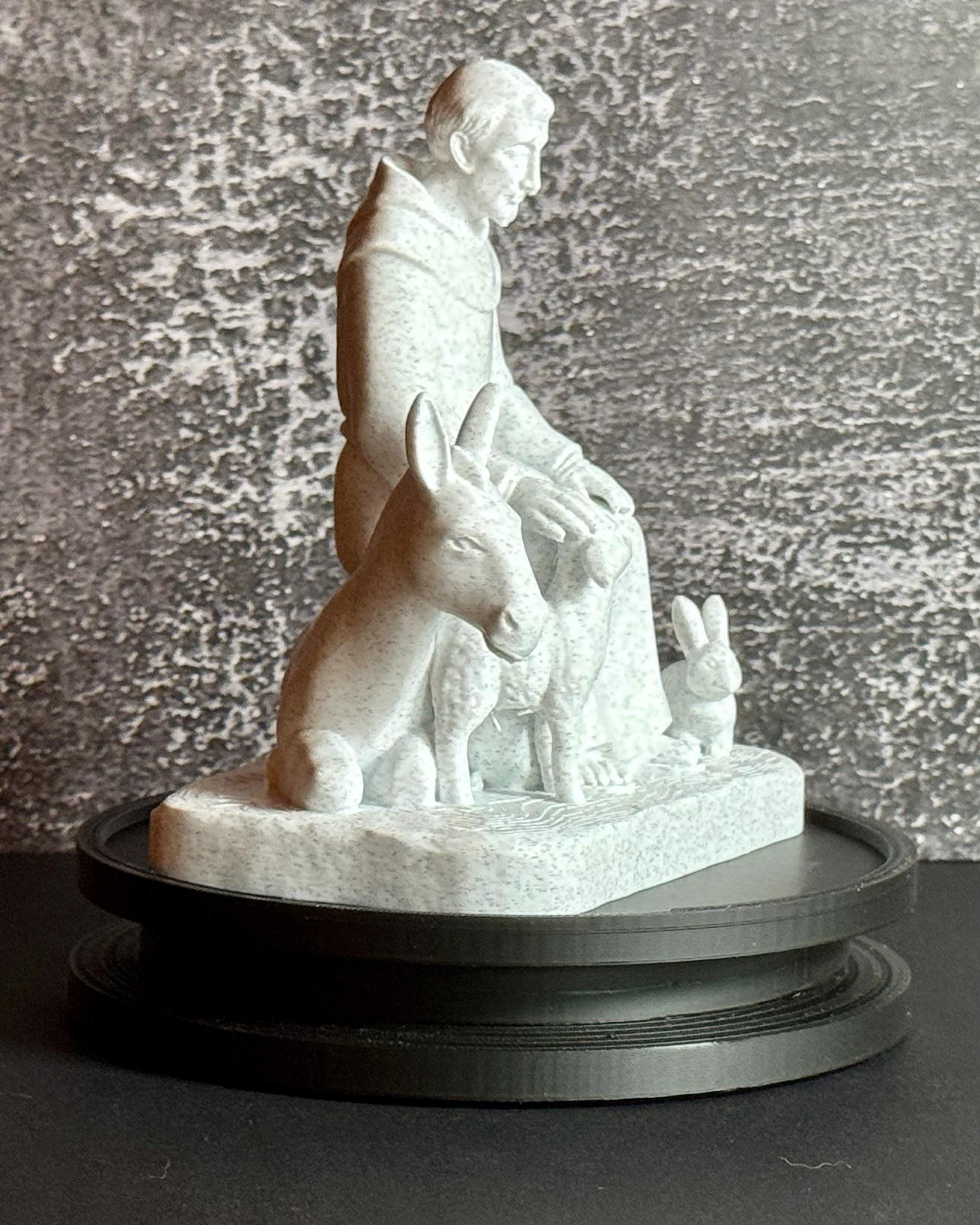 Seated St. Francis Statue with Animals