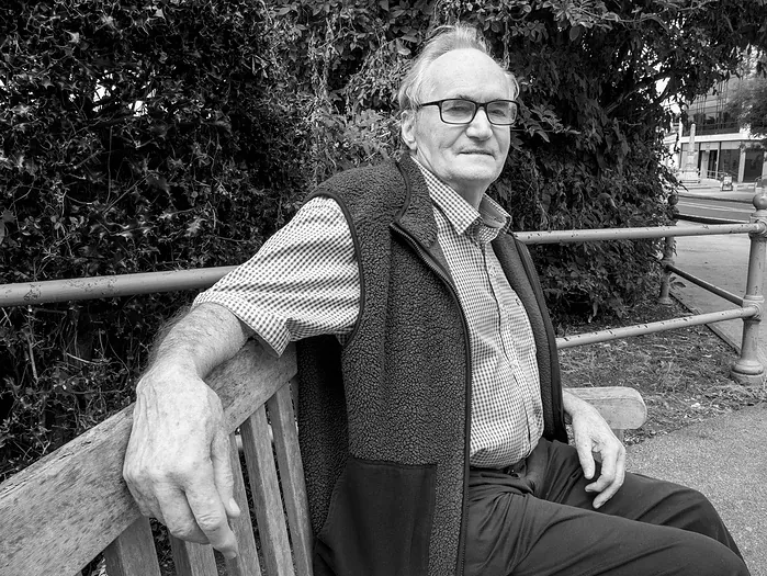 A street portrait photographed during travel.