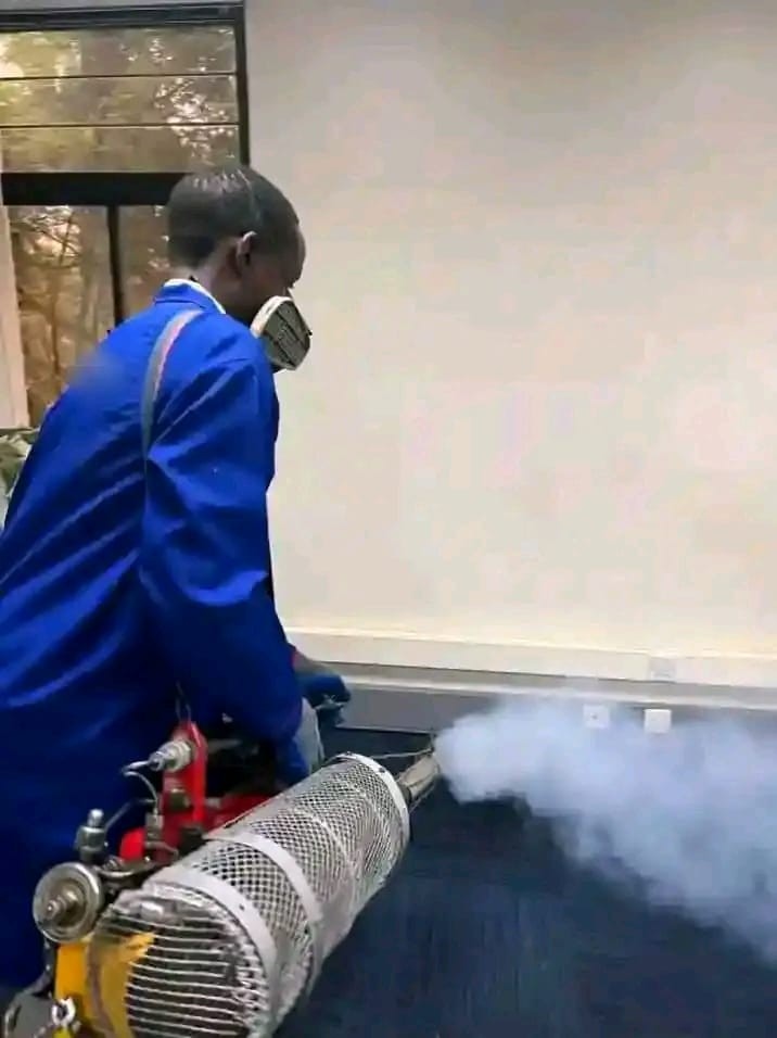 A technician carrying out indoor fumigation