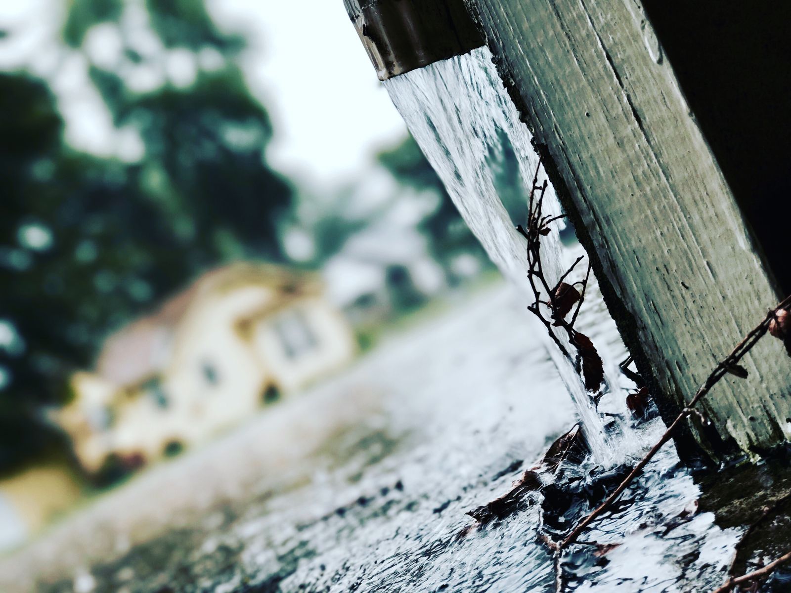 Downspout directing water away from a home