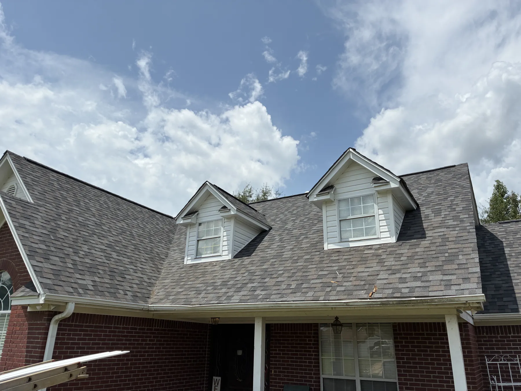 Completed shingle roof with dormers
