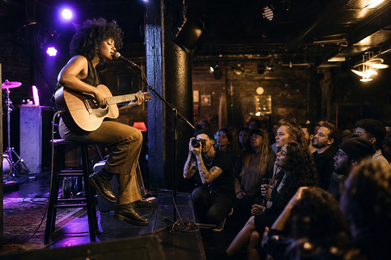 Independent singer performing for a small live audience