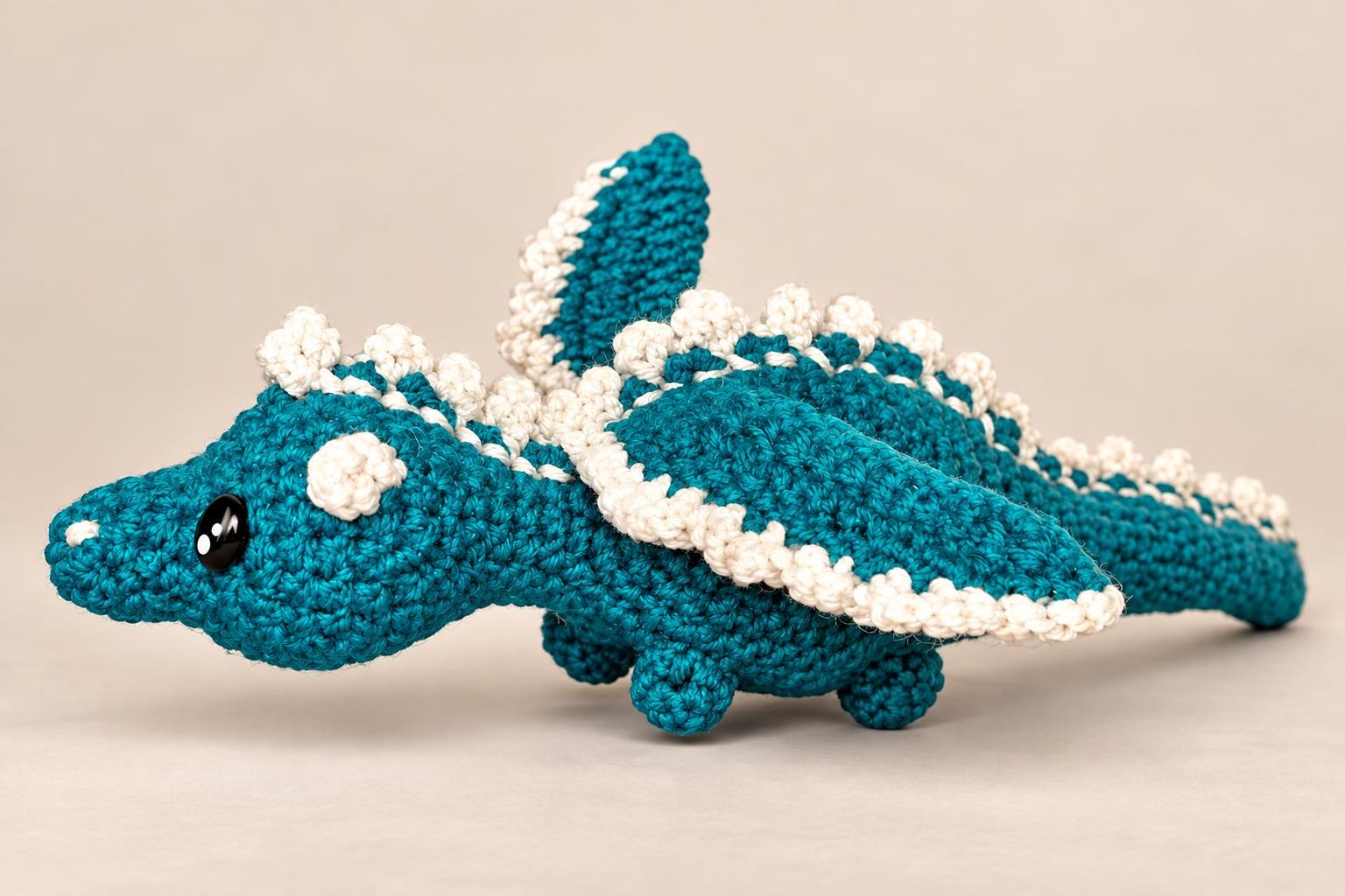 A small handmade crochet dragon that shows how a simple idea can become a playful project