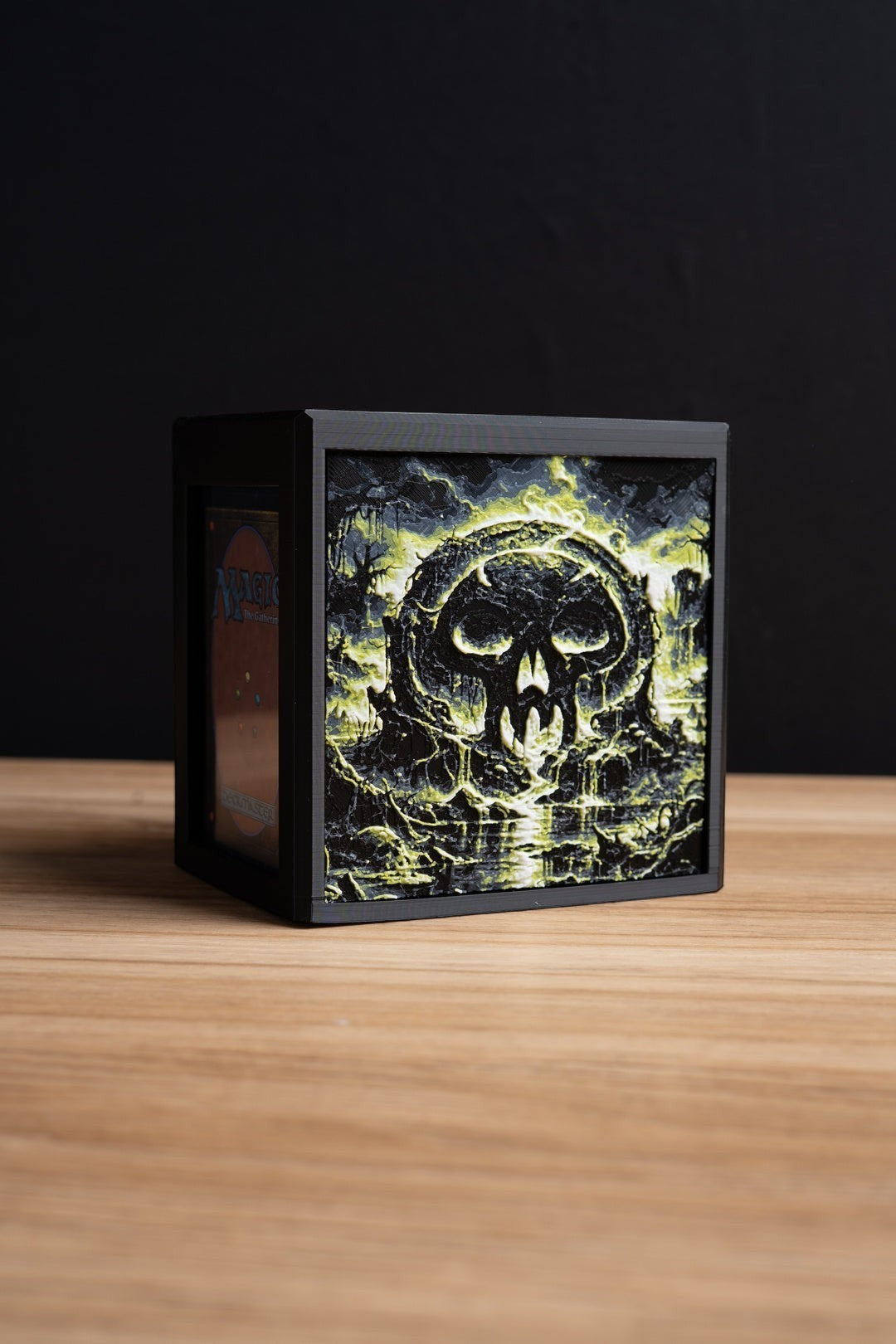 Black mana Commander deck box with a top-loading commander slot