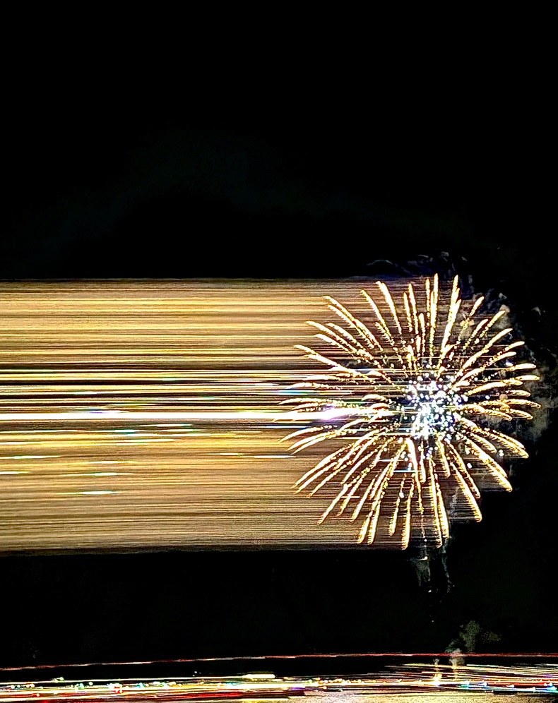 Firework and golden light trails