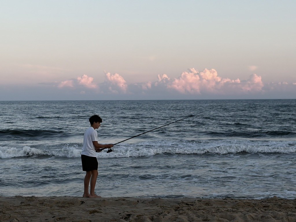 Person standing by the ocean
