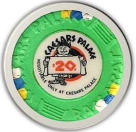 A green casino chip from Caesars Palace featuring the text 'CAESARS PALACE' and a cartoon character holding a sign that reads '20'.