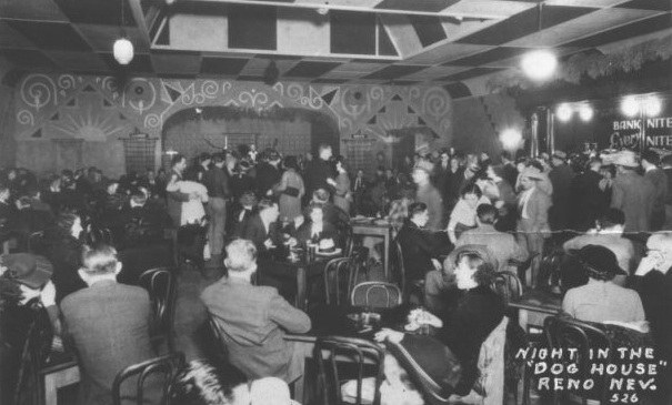 A bustling 1940s ballroom scene in Reno, Nevada, with couples dancing and patrons socializing at tables, showcasing vintage fashion and decor.
