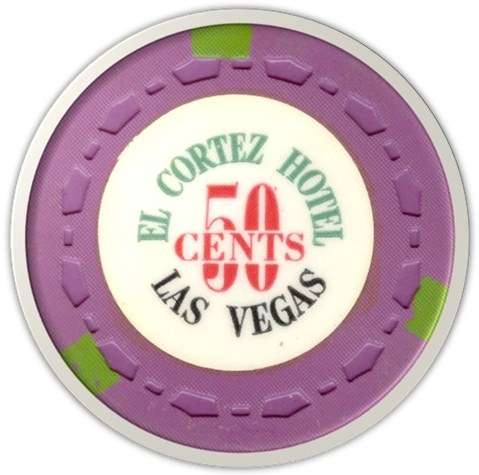A 50-cent casino chip from the El Cortez Hotel in Las Vegas, featuring a purple background and green accents.