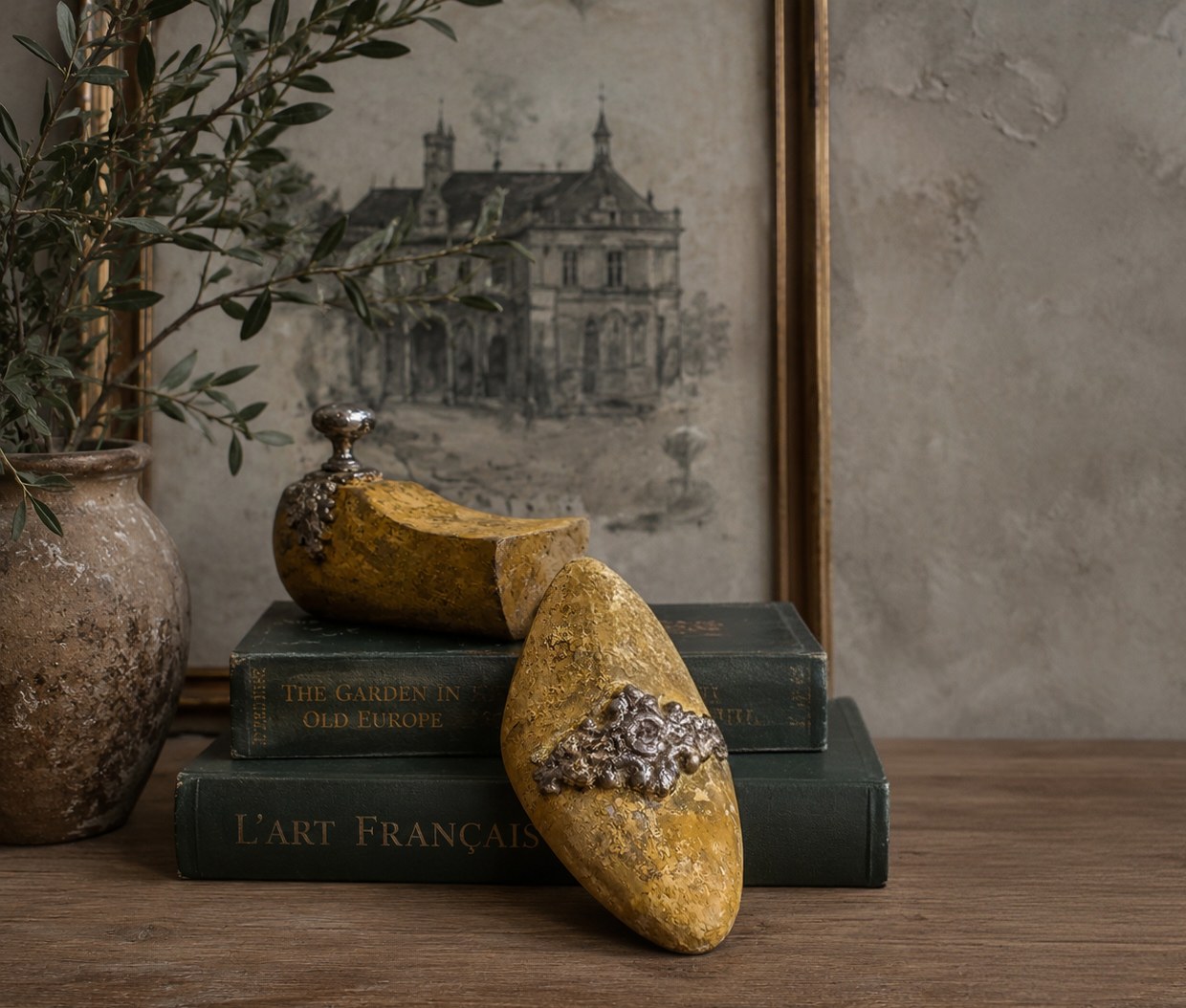 Hand-finished gilded shoe forms styled on antique books