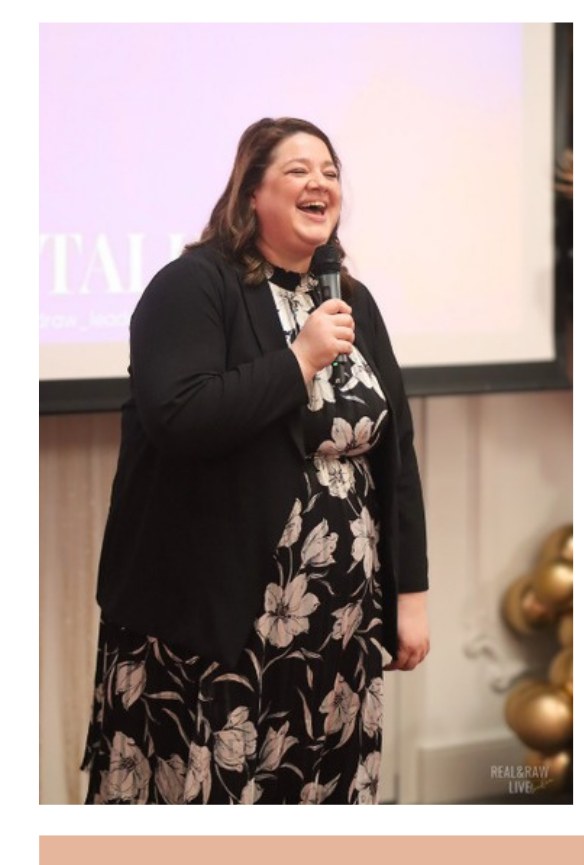 Danielle Young speaking with a microphone
