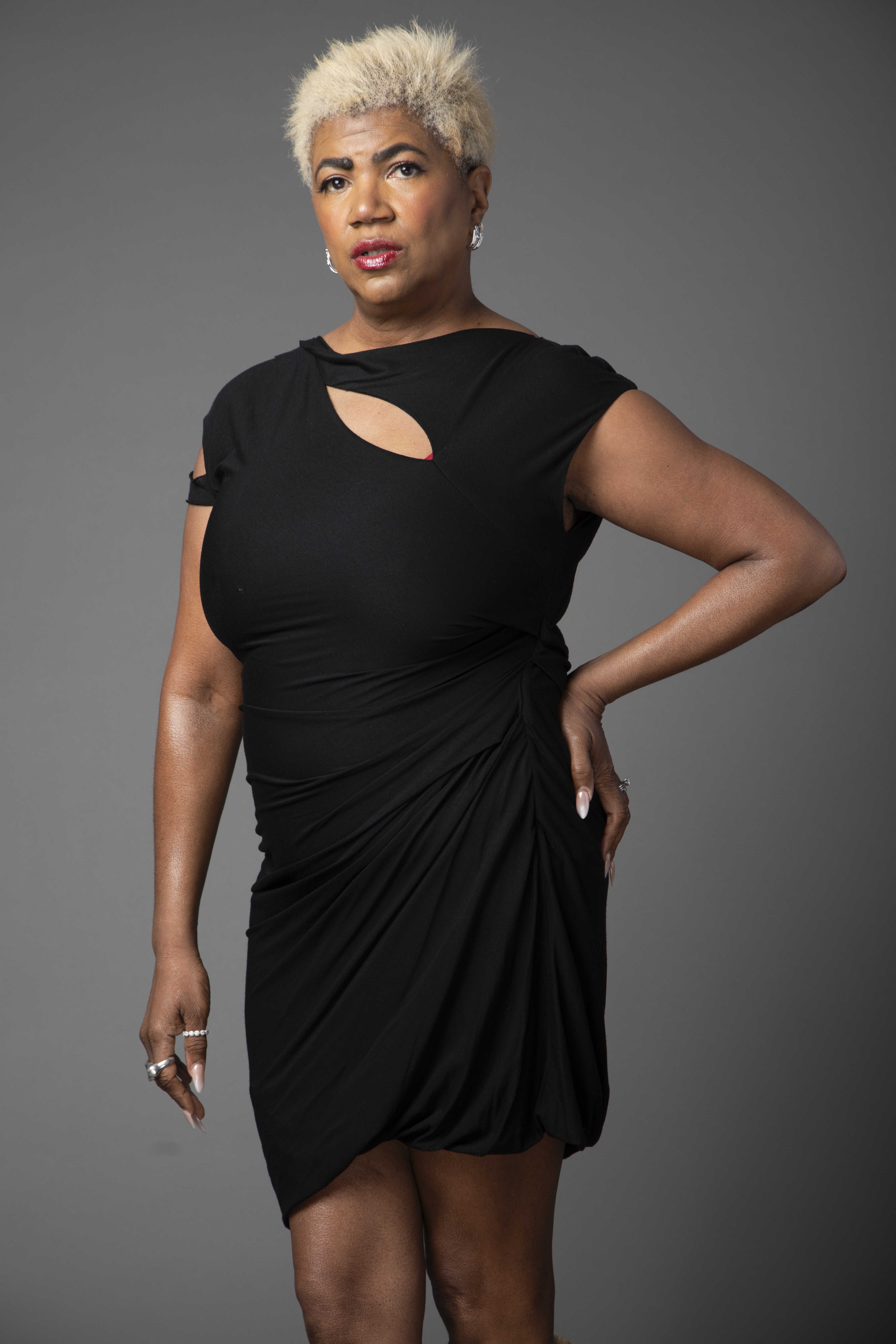 Anya Audette in a black stage look