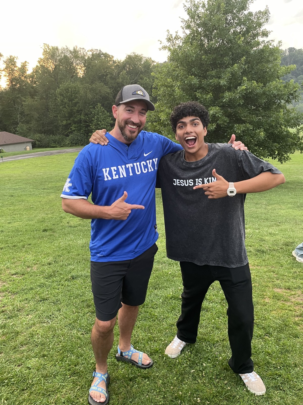 Brad Powell smiling with a fellow adventurer outdoors