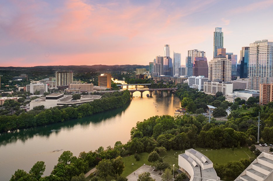 Austin skyline and Lady Bird Lake at sunset