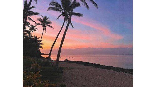 Fiji sunset over the water