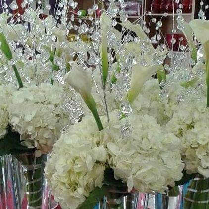 Hand-arranged flowers by Anastasia's Blooms