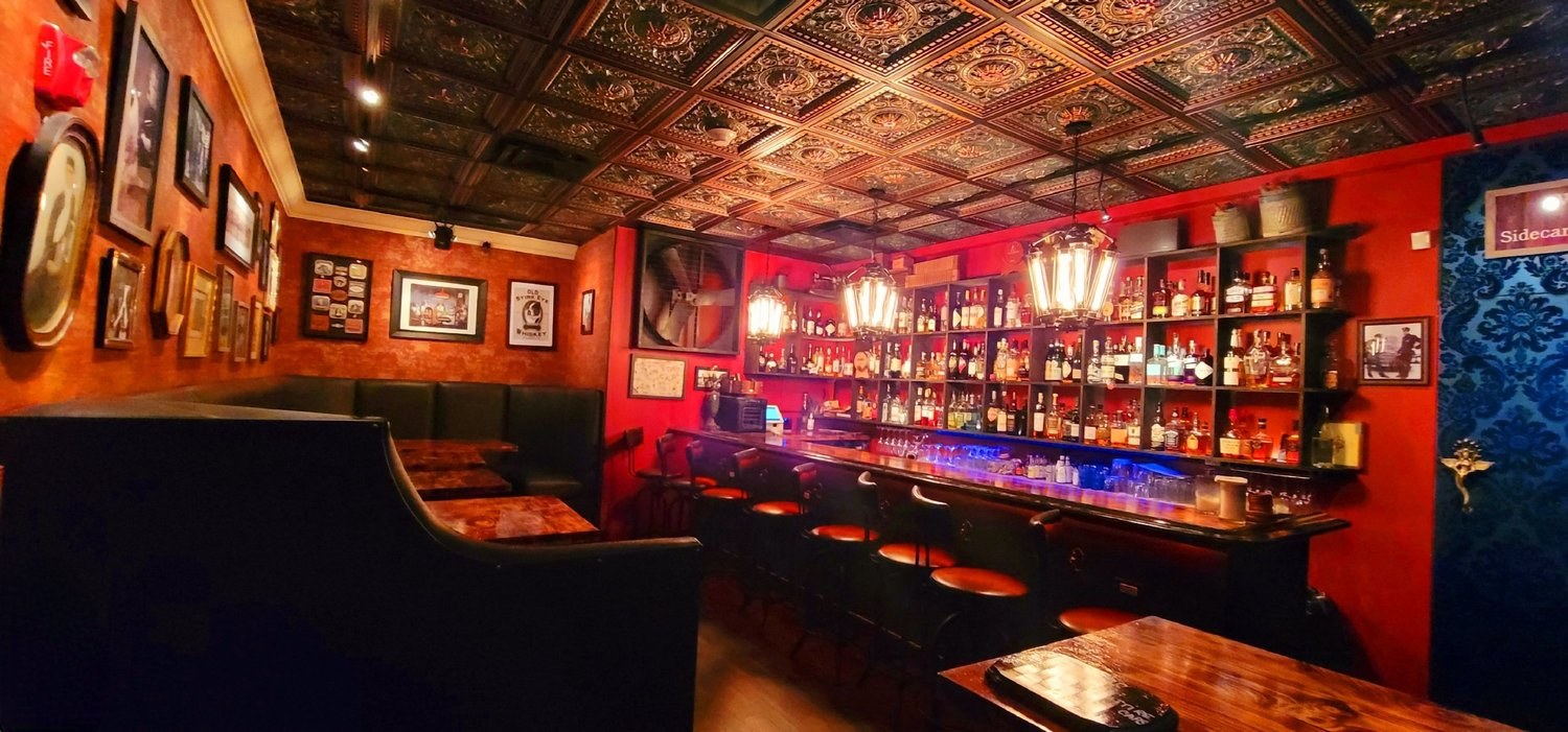 The tucked-away cocktail room at Vinos on Las Olas