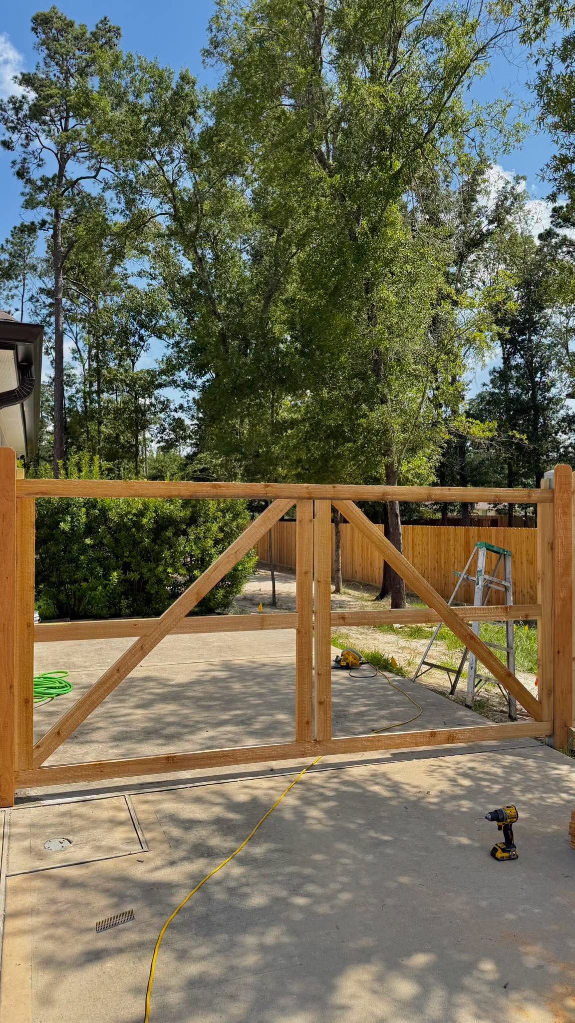Wood double gate during installation