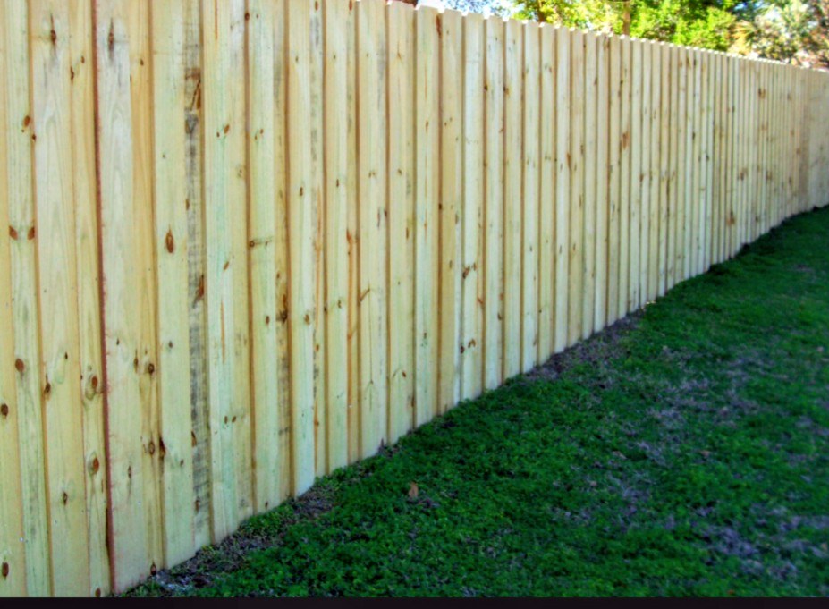 Finished wood privacy fence run