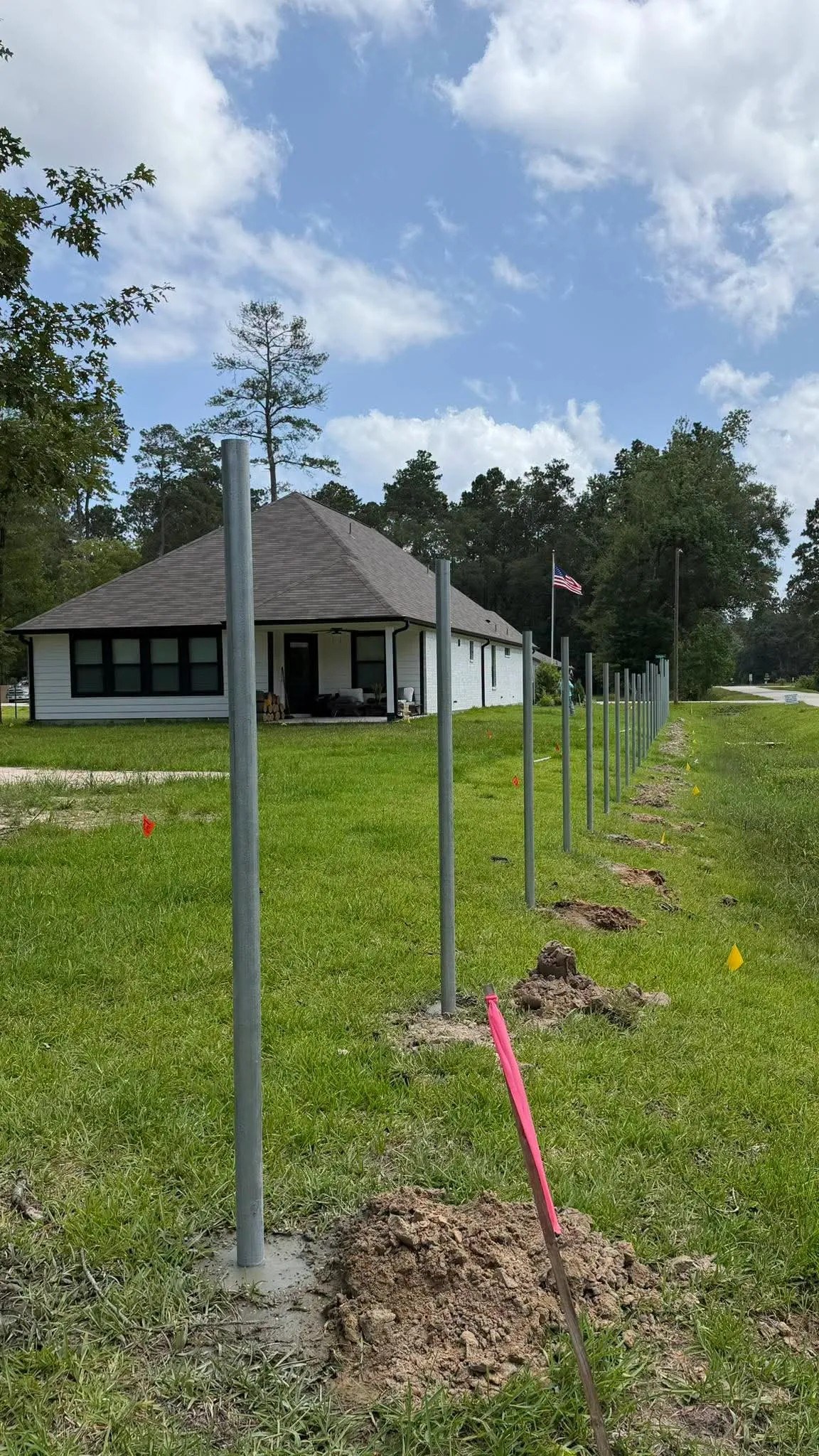Steel posts set for a new wood fence