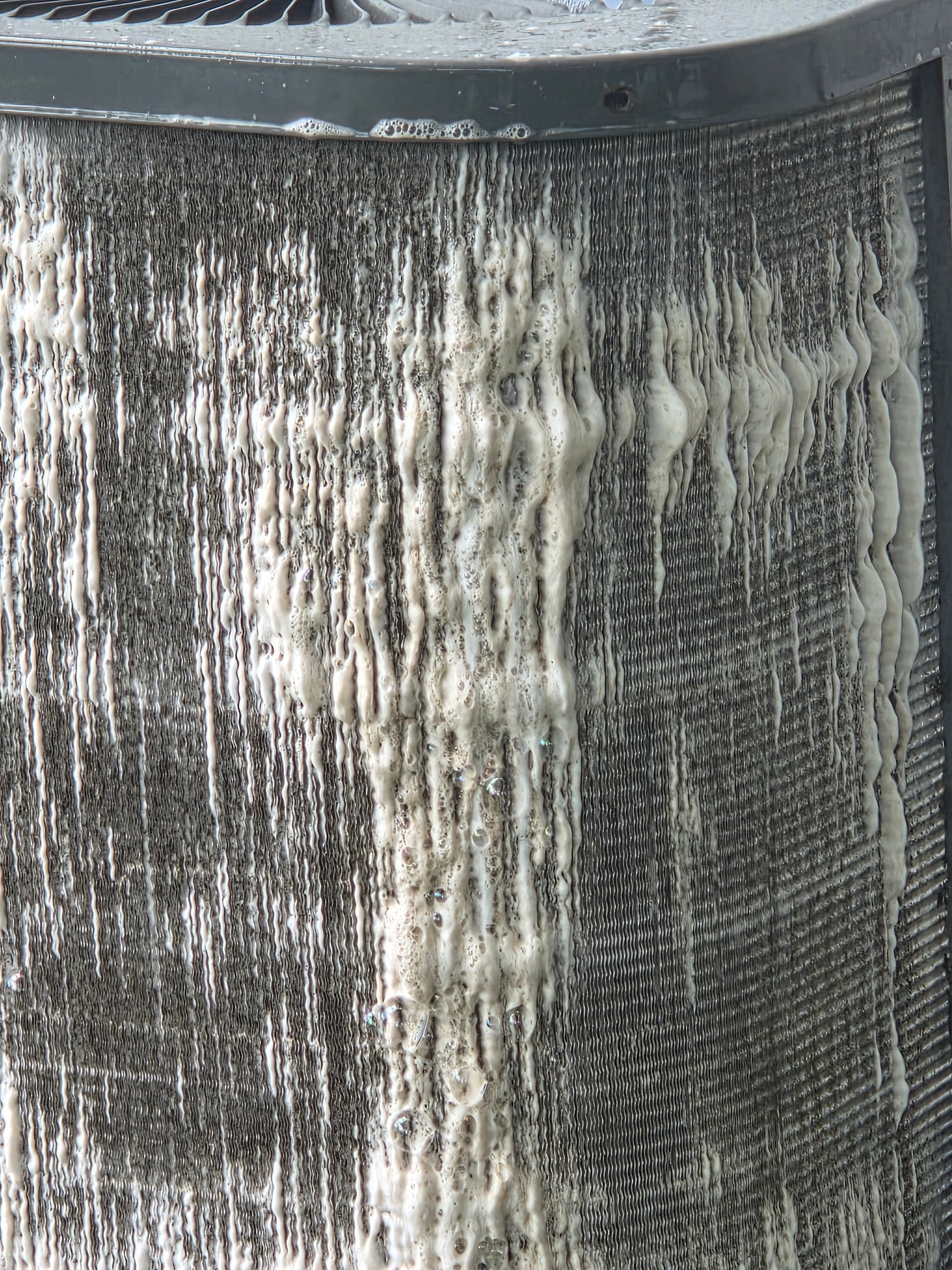 Outdoor air conditioning coil during service