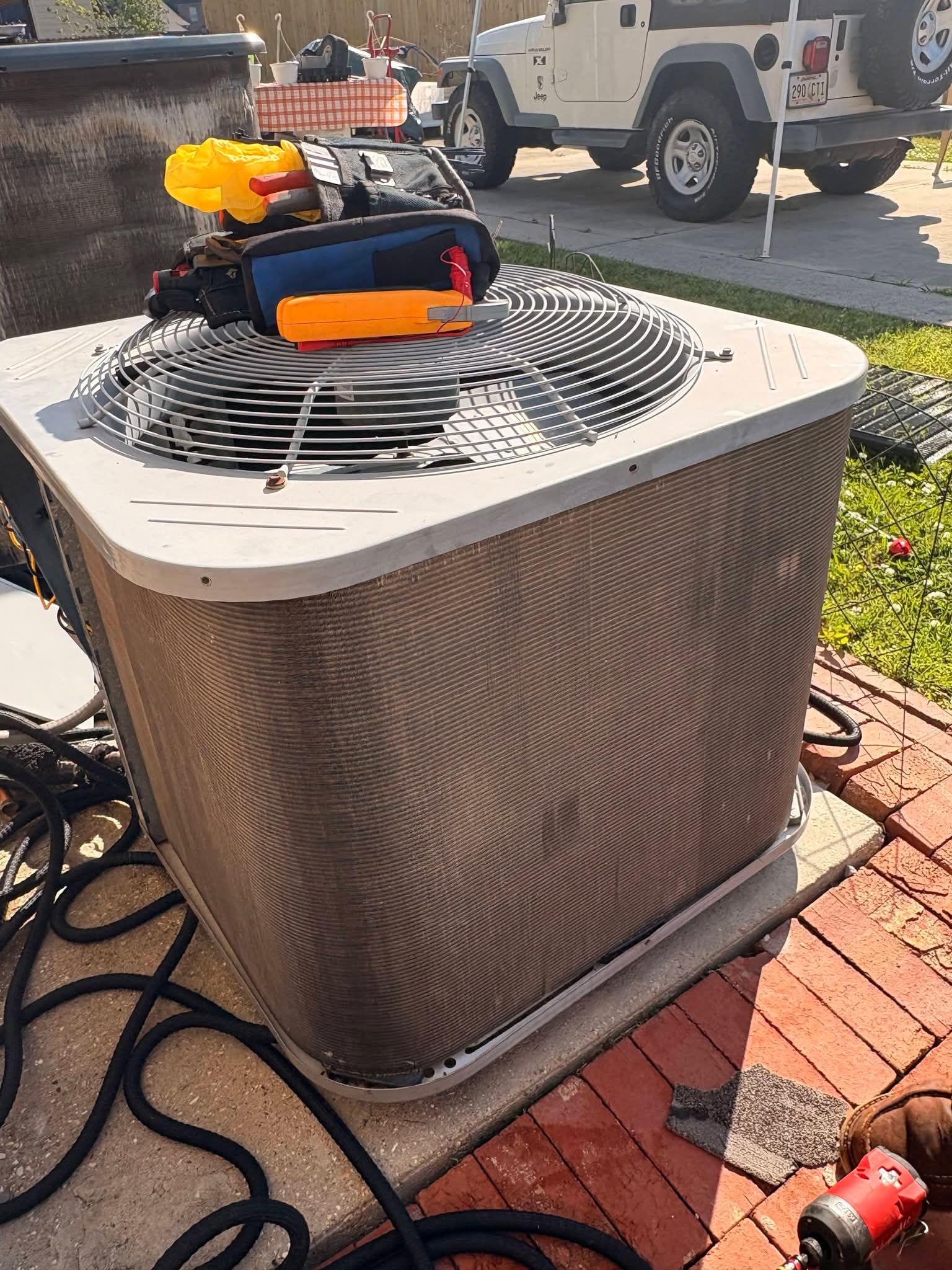 Outdoor air conditioning unit during a service visit