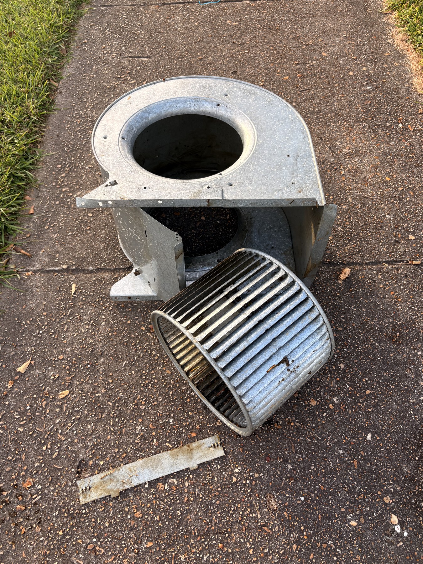Removed HVAC blower wheel and housing during service