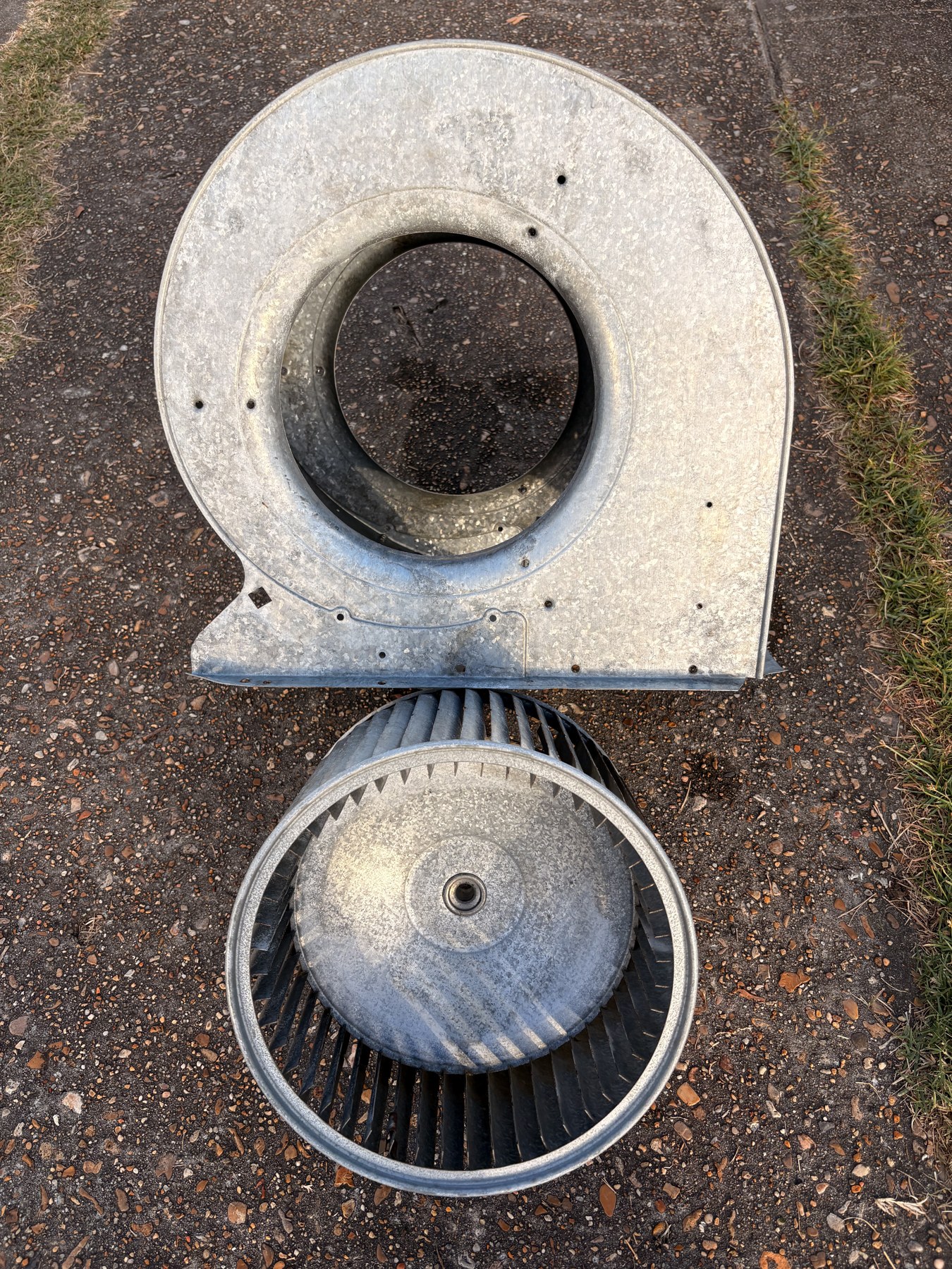 HVAC blower housing and wheel laid out for maintenance