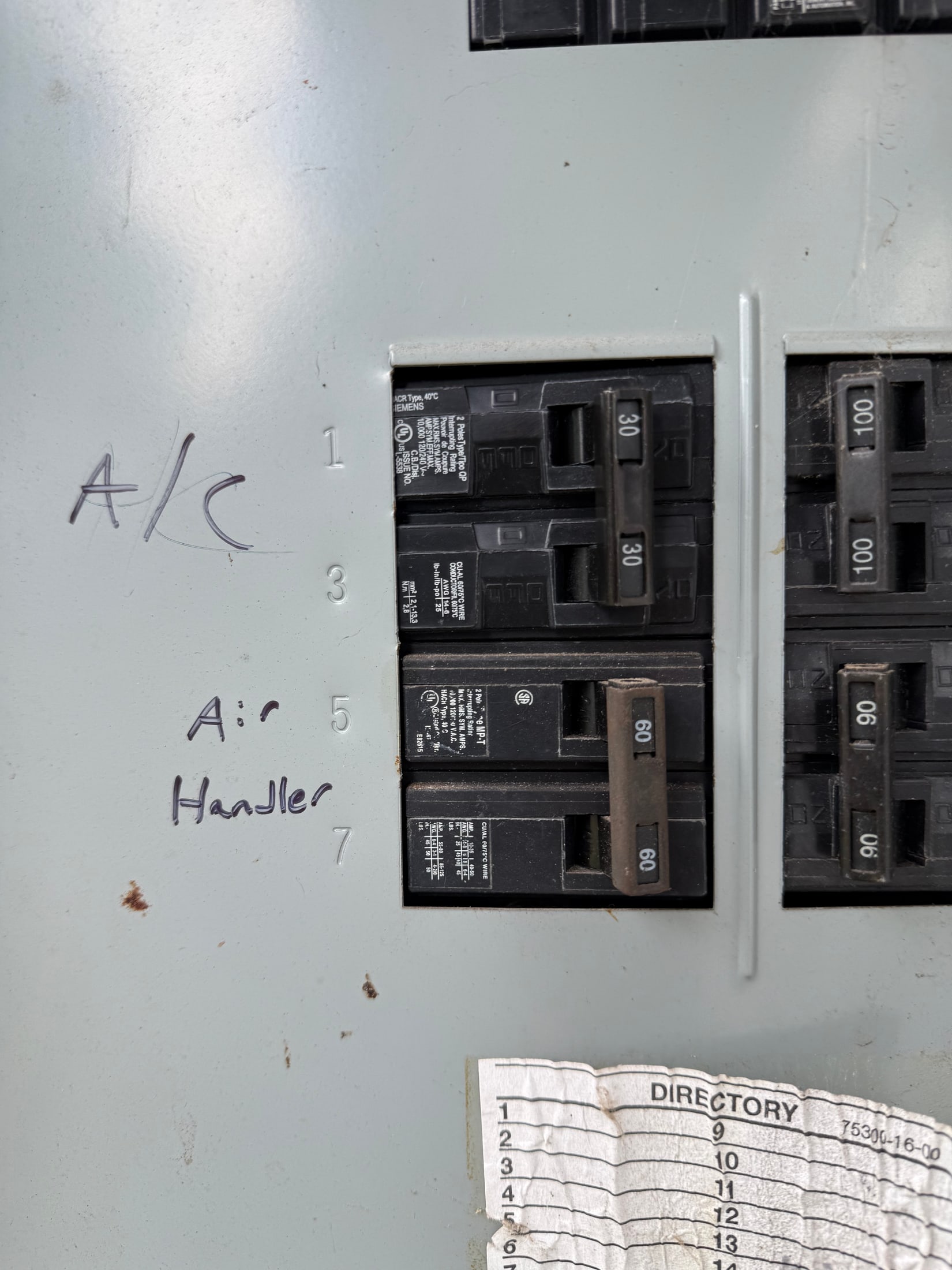 Electrical panel inspected during HVAC service