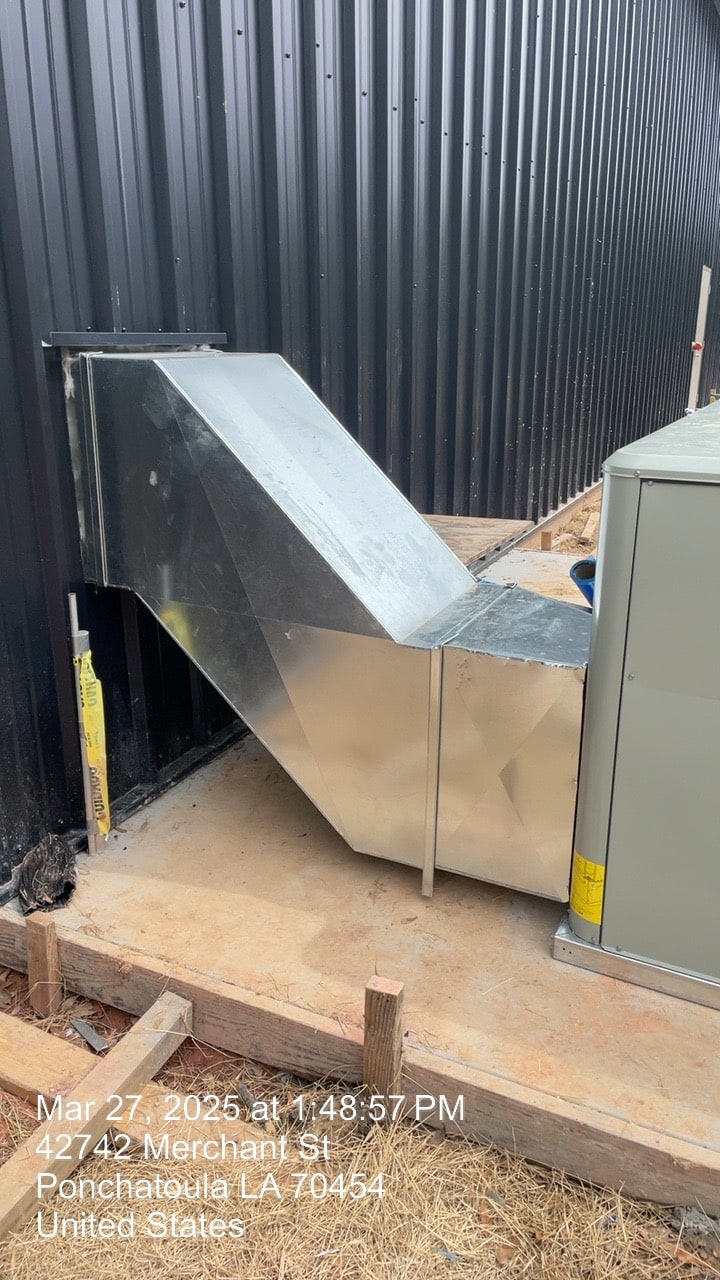 Outdoor HVAC equipment and duct transition at a commercial property