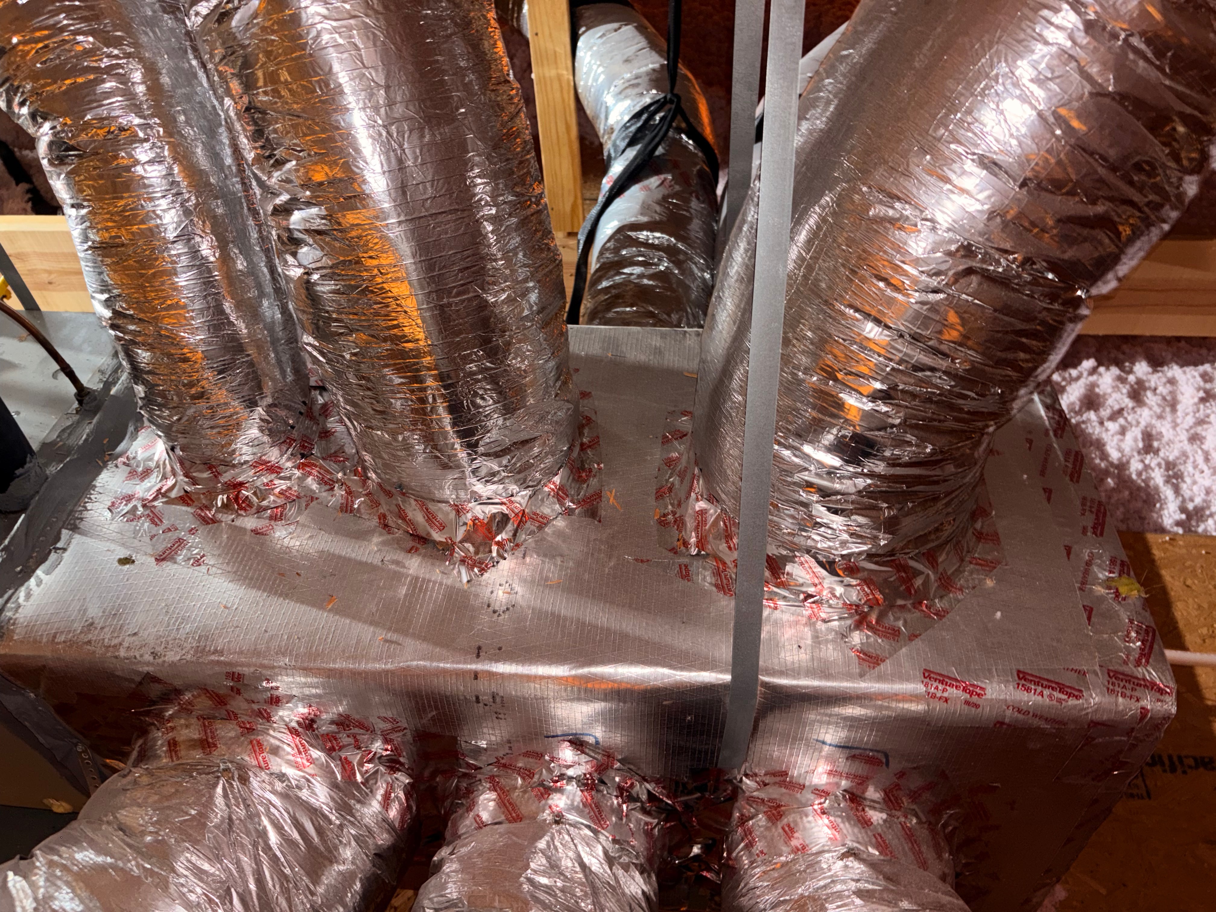 Flexible attic ductwork connected to a residential HVAC system