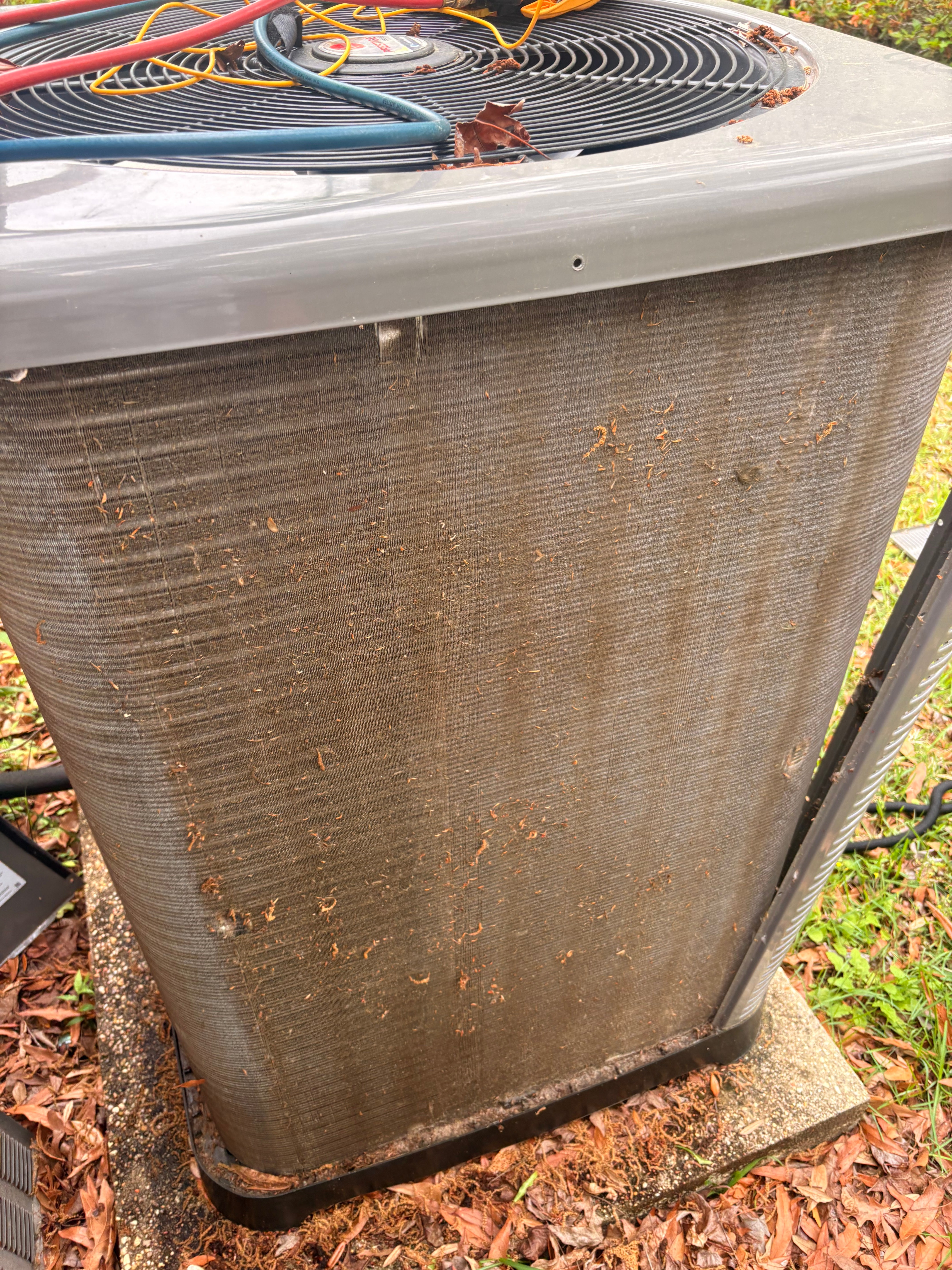 Outdoor air conditioning condenser prepared for service