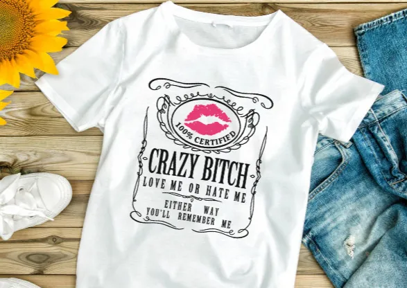 White t-shirt with “Crazy Bitch” design, Love me or hate me. 2 Sisters Tanks Teez and More