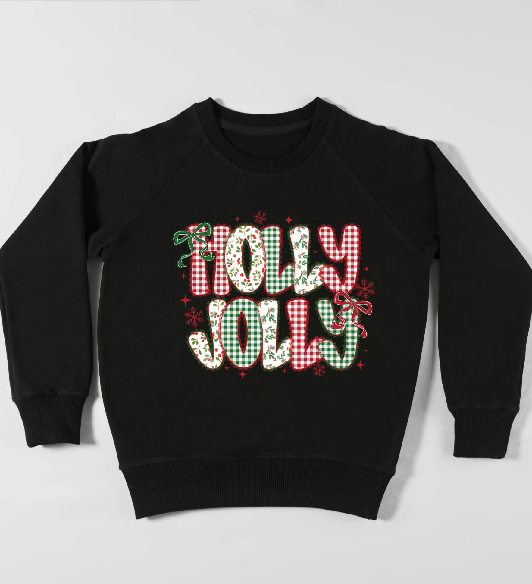 Black sweatshirt with HOLLY JOLLY text and Christmas accents, festive theme.