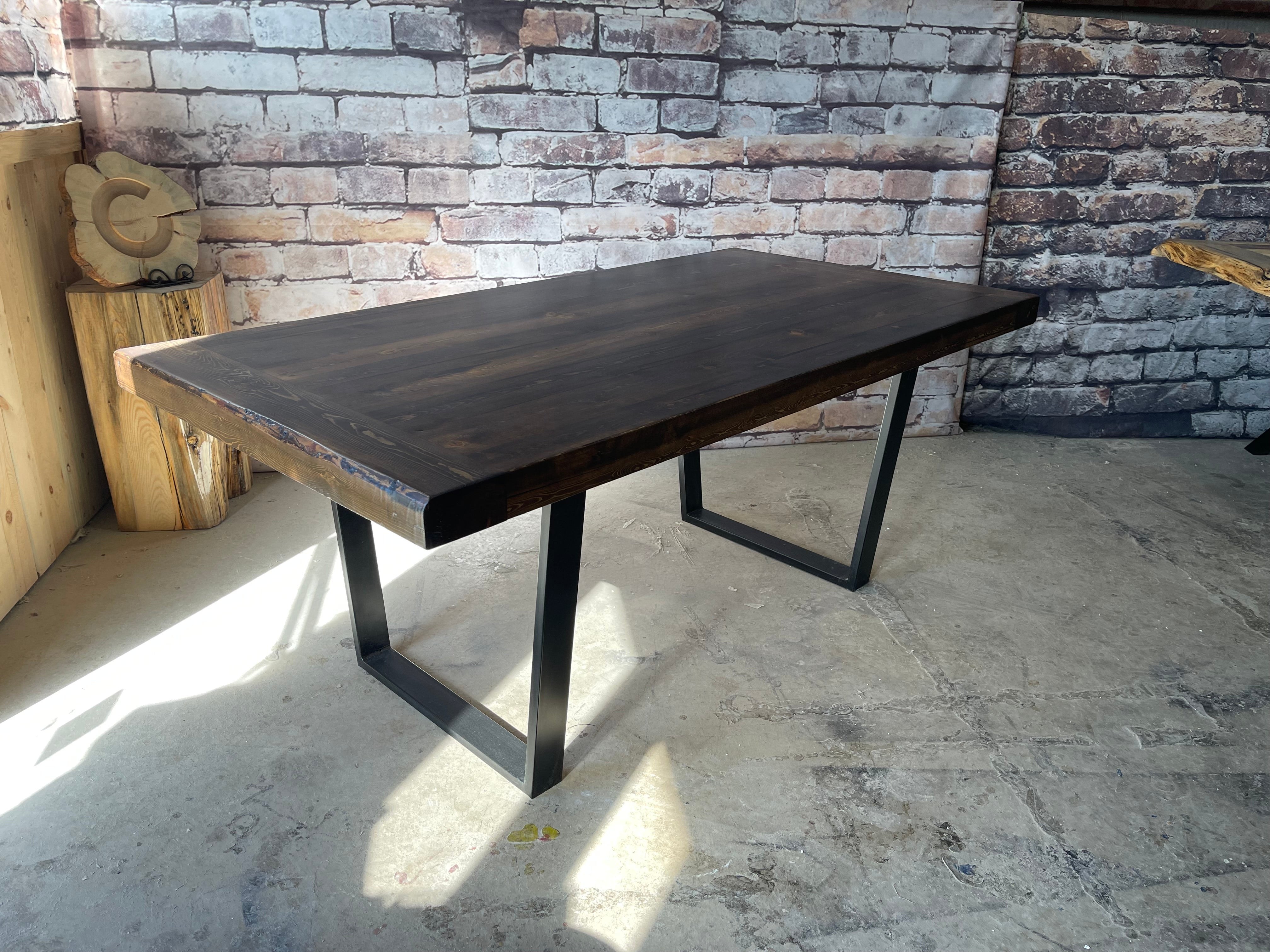 One-of-a-kind blue-stained pine dining table with a steel base
