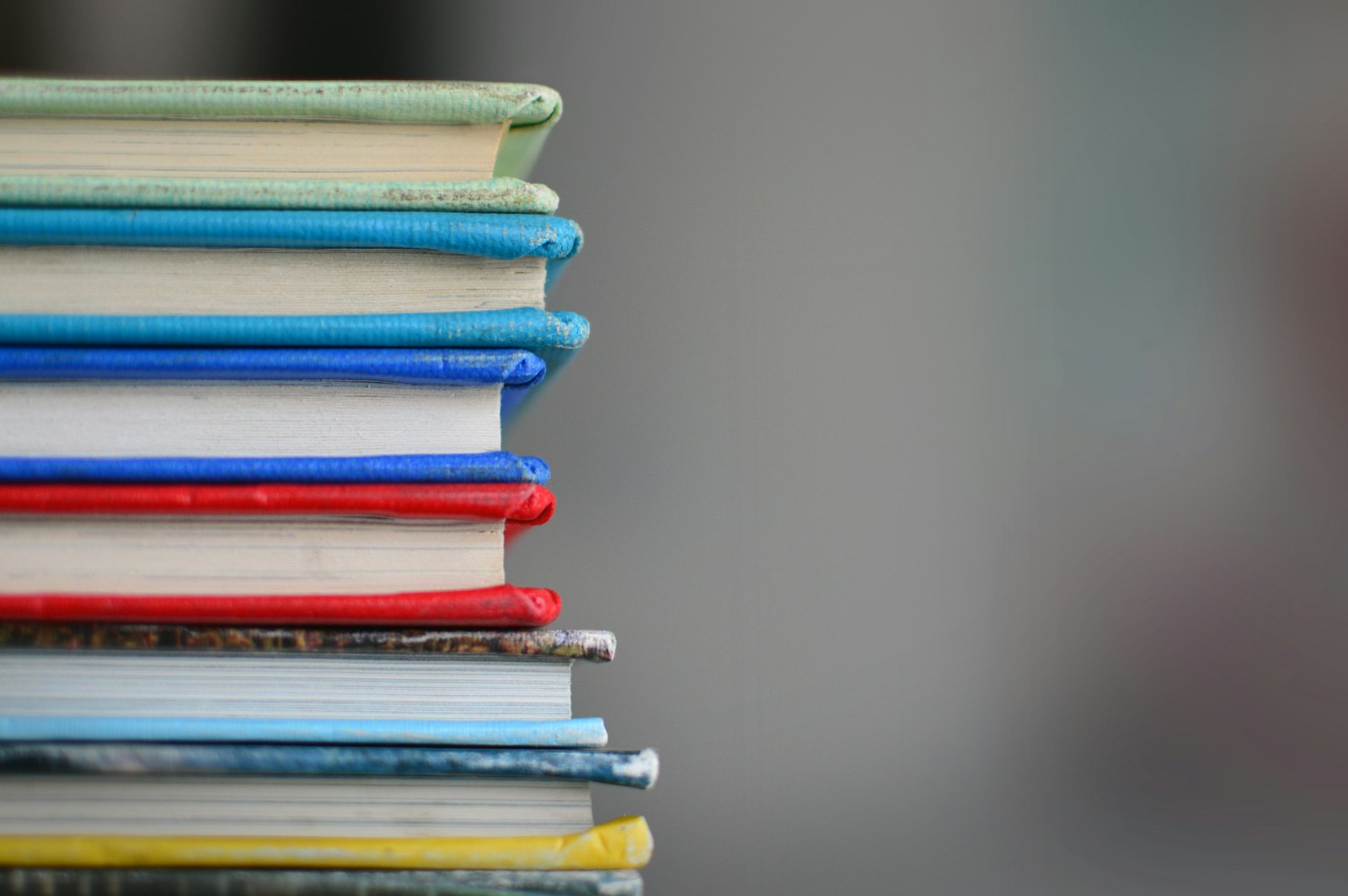 A stack of colorful books ready for a short reading routine