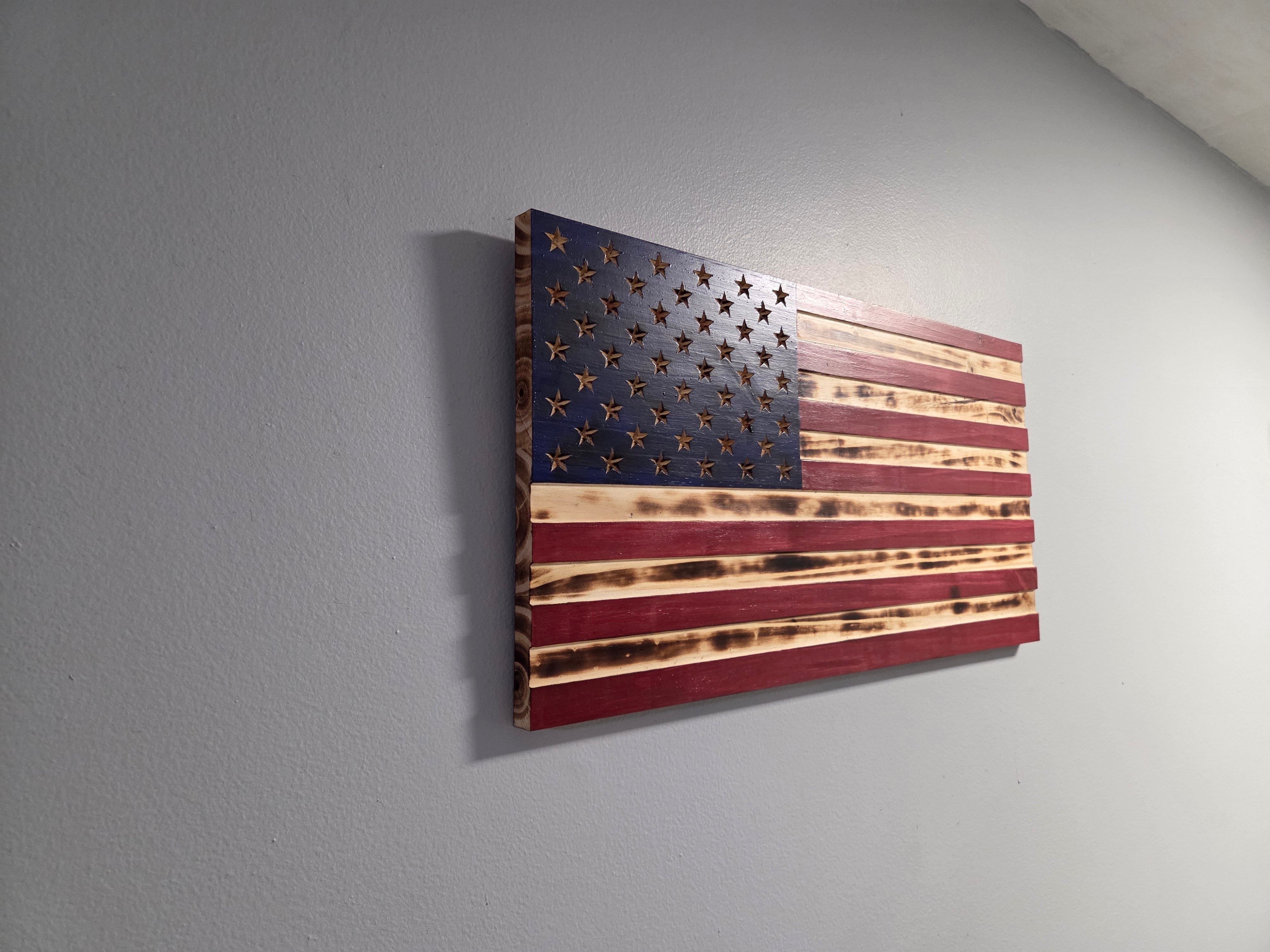 Handcrafted wooden American flag with carved stars