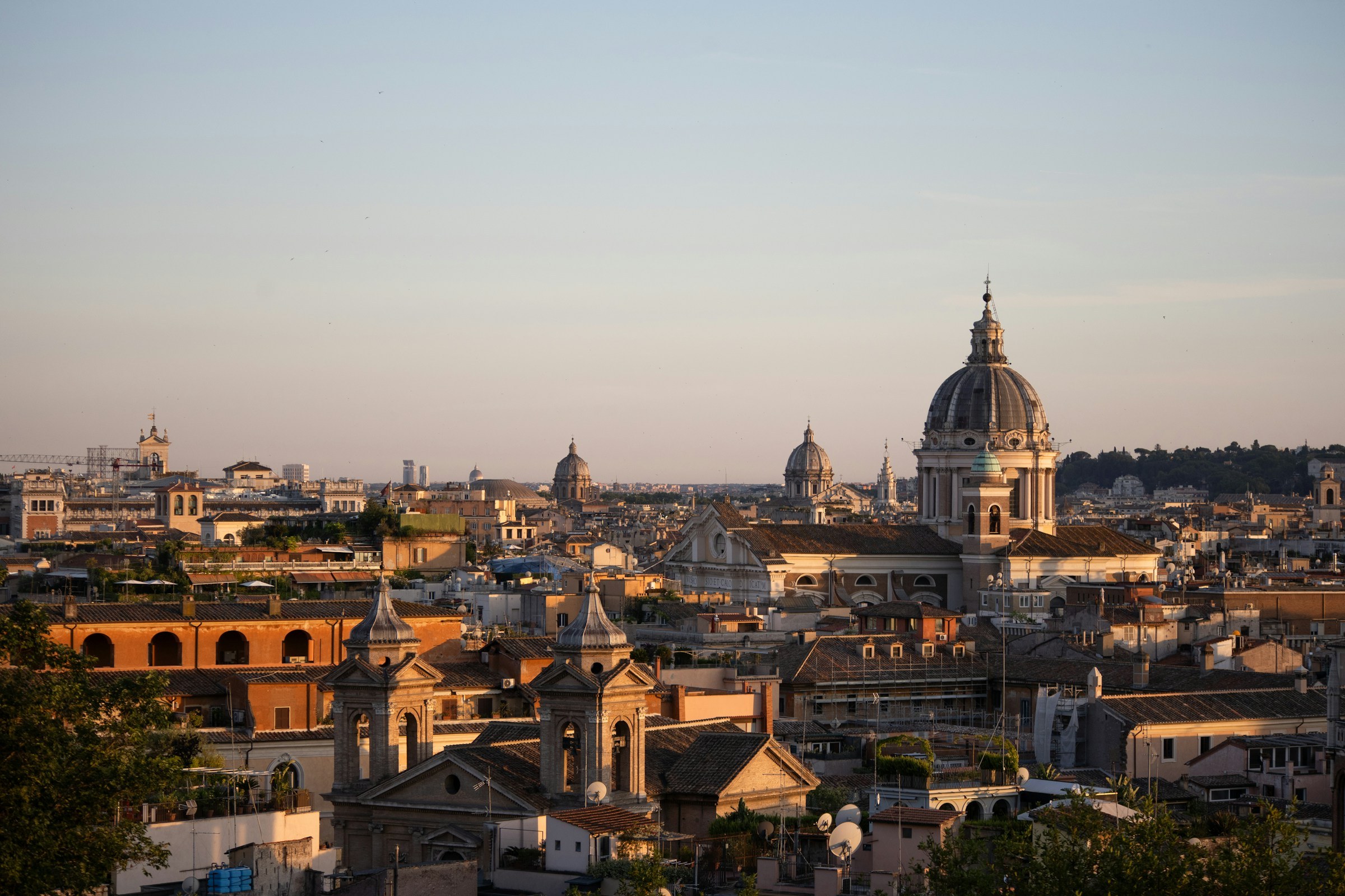 Rome’s domes and rooftops in warm evening light
