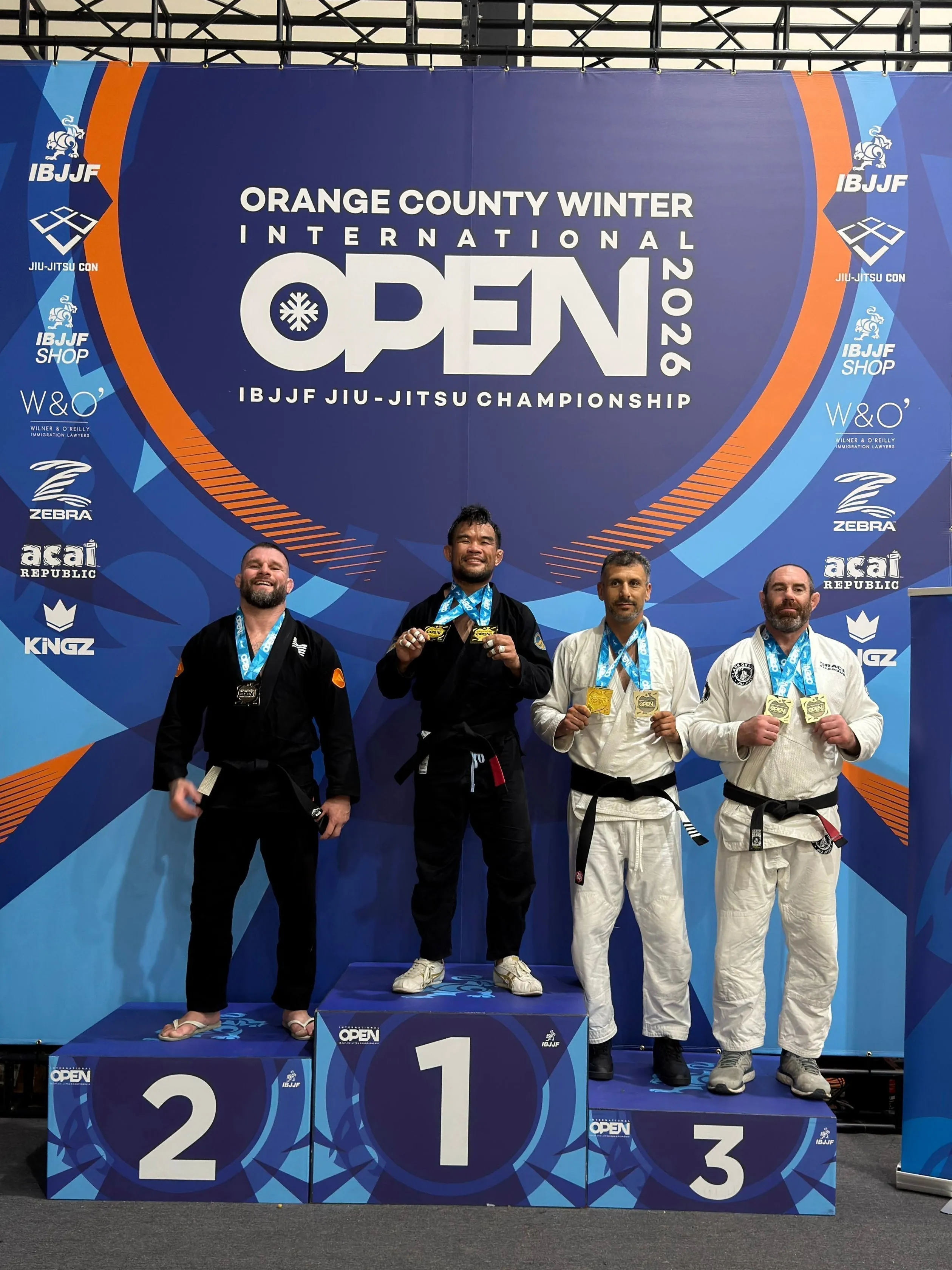 Jimmy Tat on a first-place podium after an IBJJF event