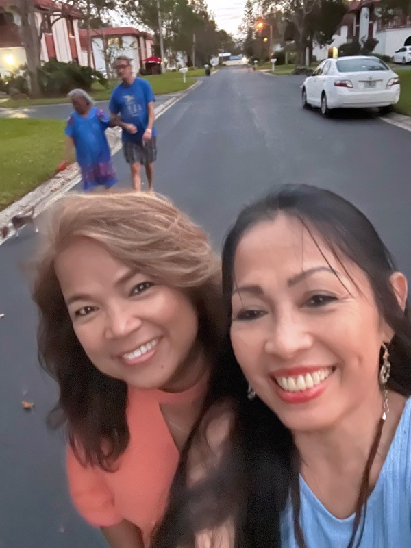 Neighbors smiling together
