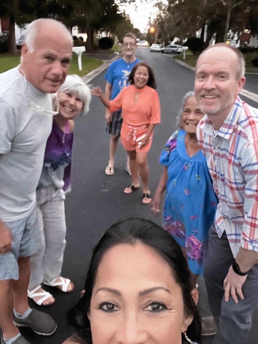 Friends gathering together outdoors