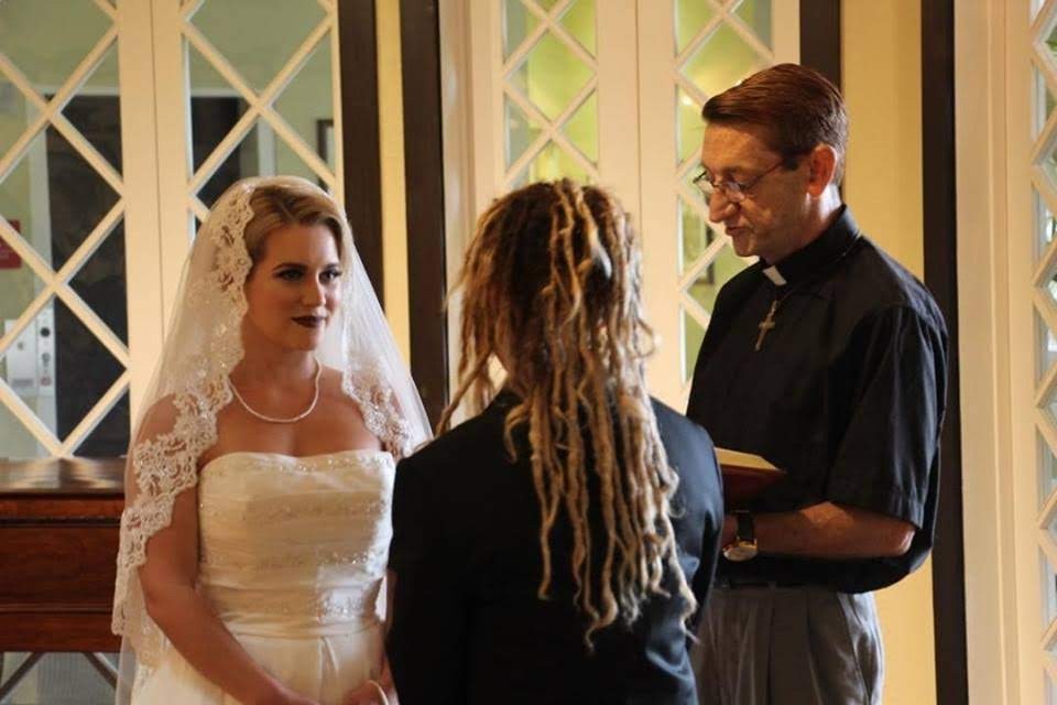 Pastor Mark officiating a wedding ceremony