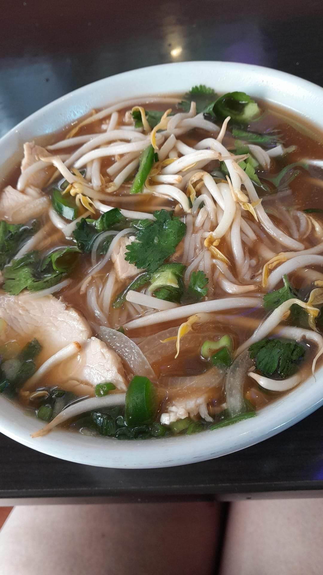 A bowl of soup prepared with fresh ingredients