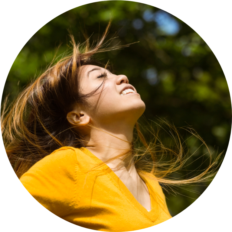 A woman enjoying a peaceful moment outdoors