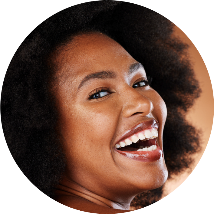 A woman smiling with joy