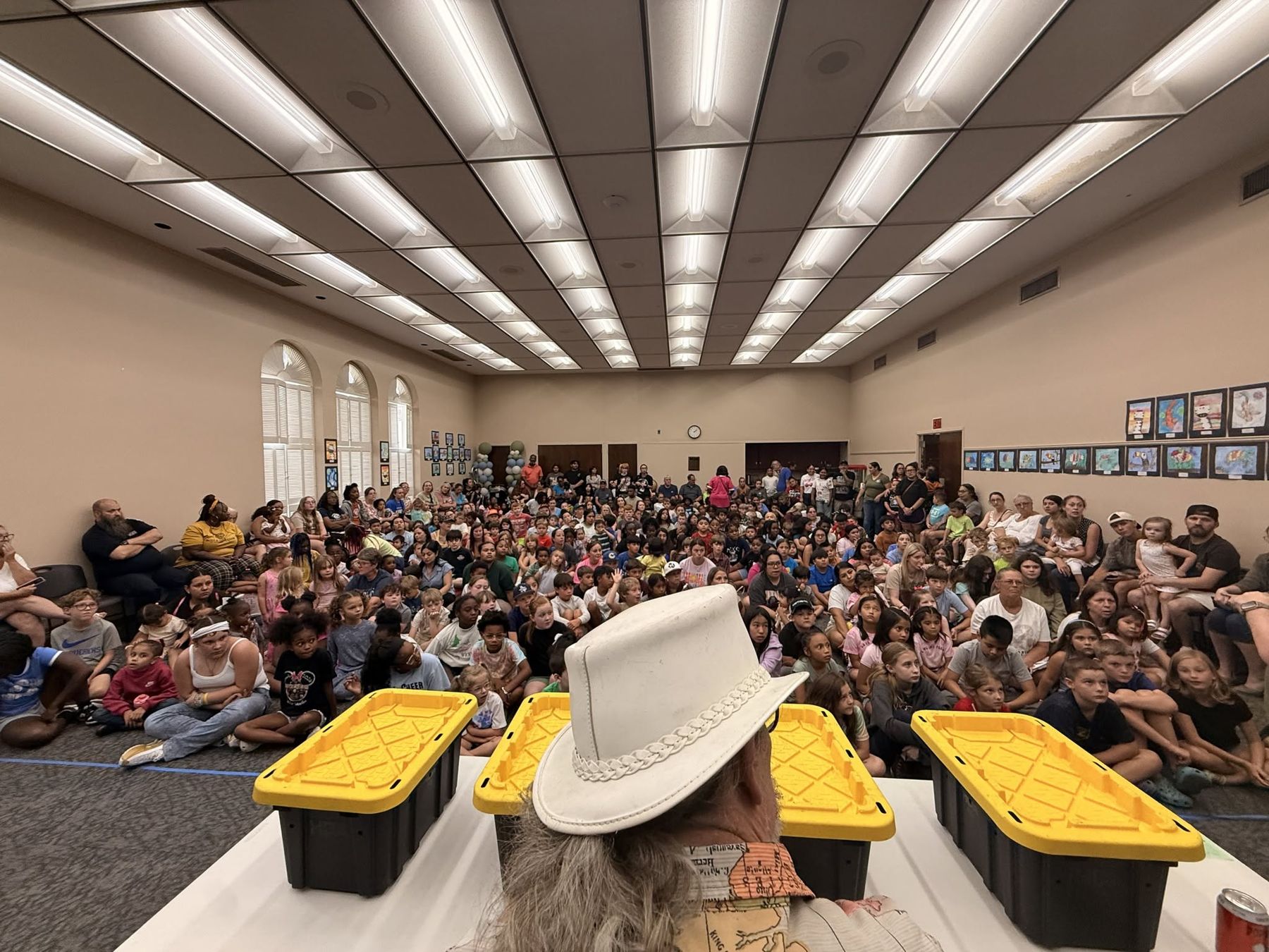 A large audience watching a Snake Encounters show in Corsicana