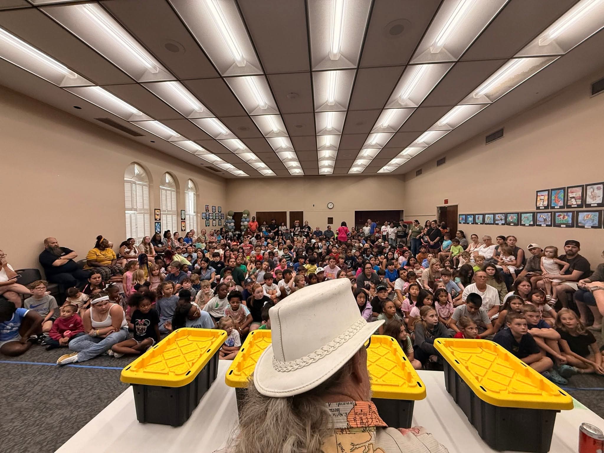 A packed audience at a Snake Encounters reptile show